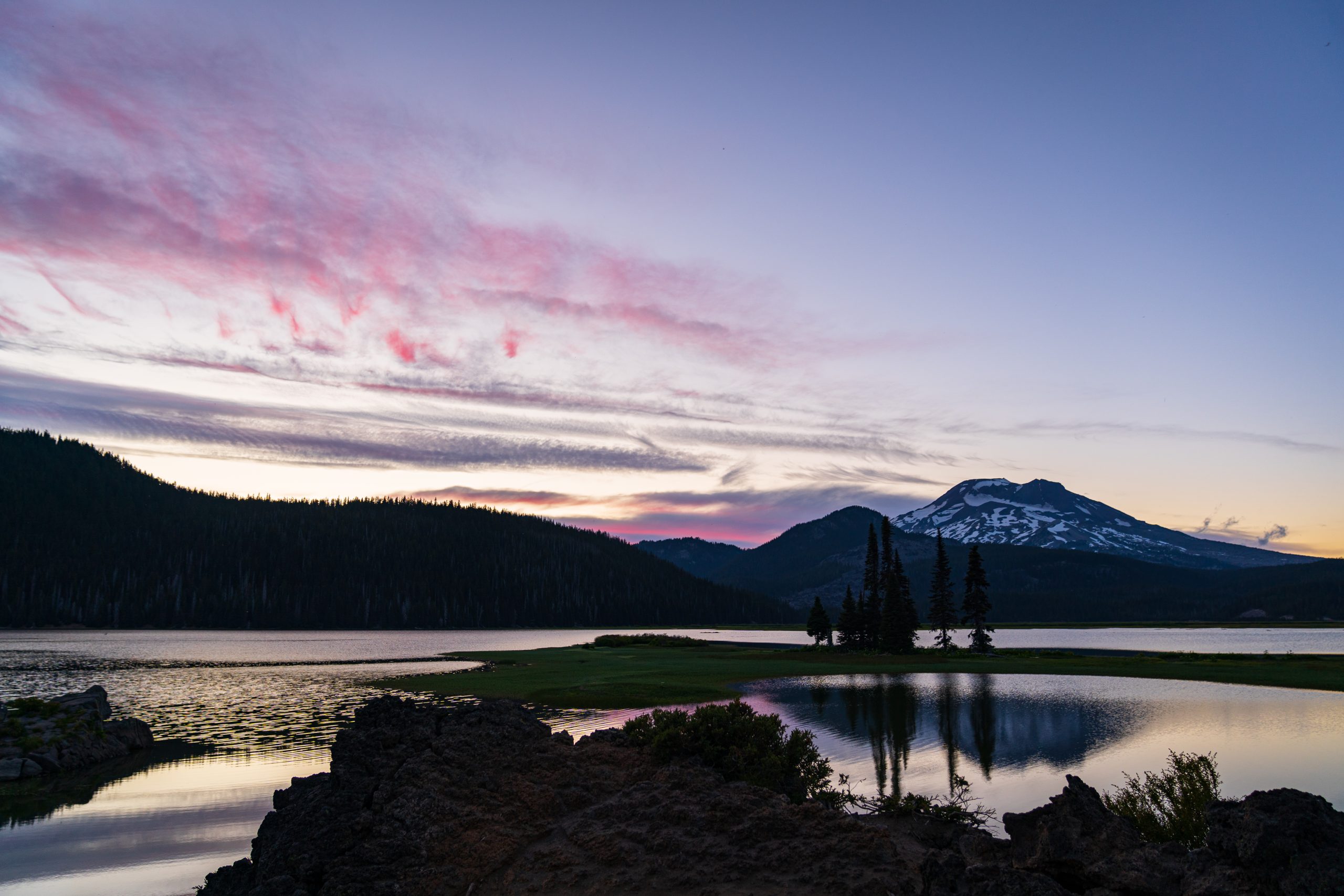 Embark on the scenic Cascade Lakes Highway for a journey through Oregon's breathtaking landscapes.