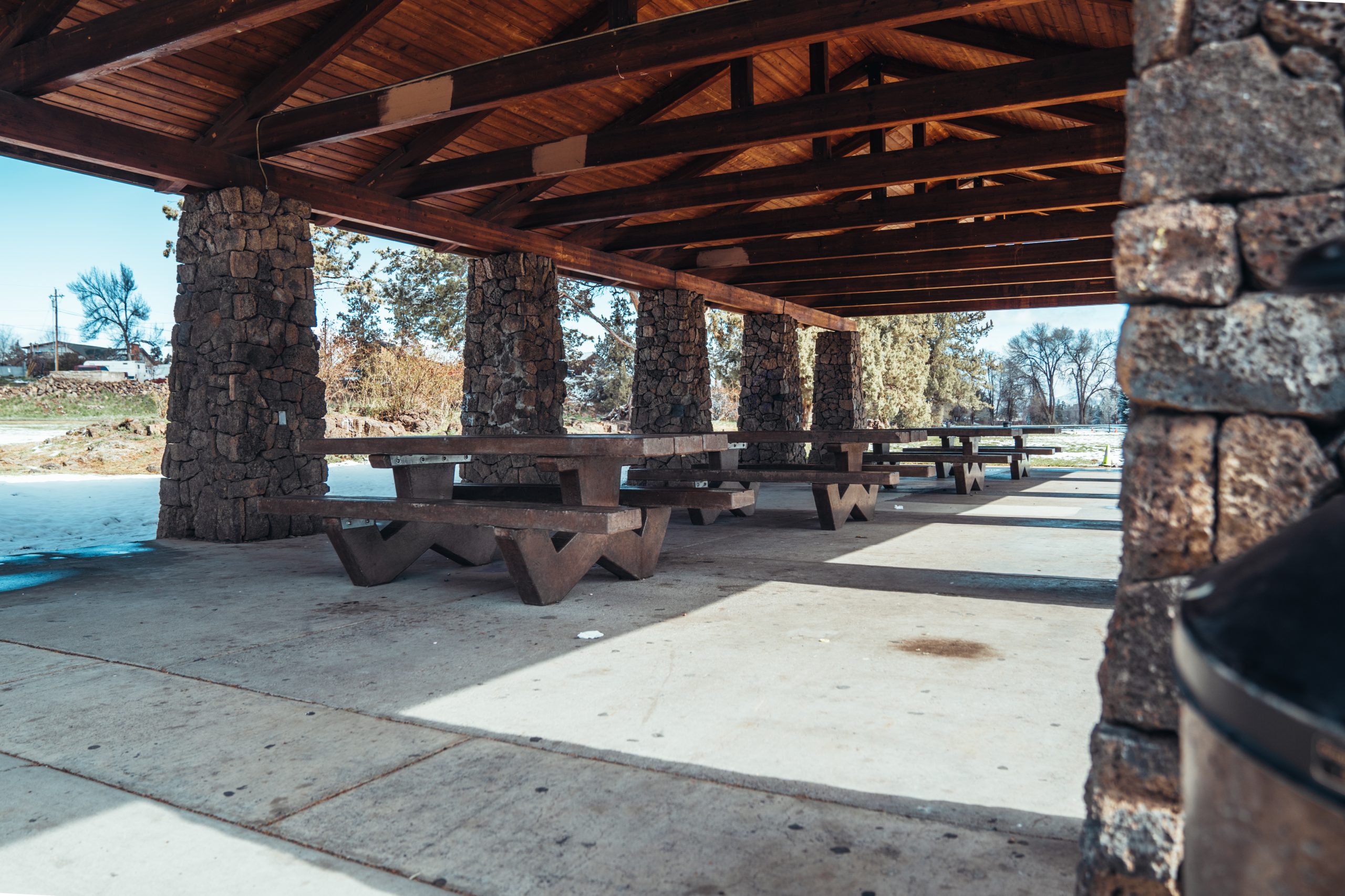 Enjoy a peaceful family picnic at Sam Johnson Park, a perfect spot to relax and reconnect amidst Redmond's natural beauty.